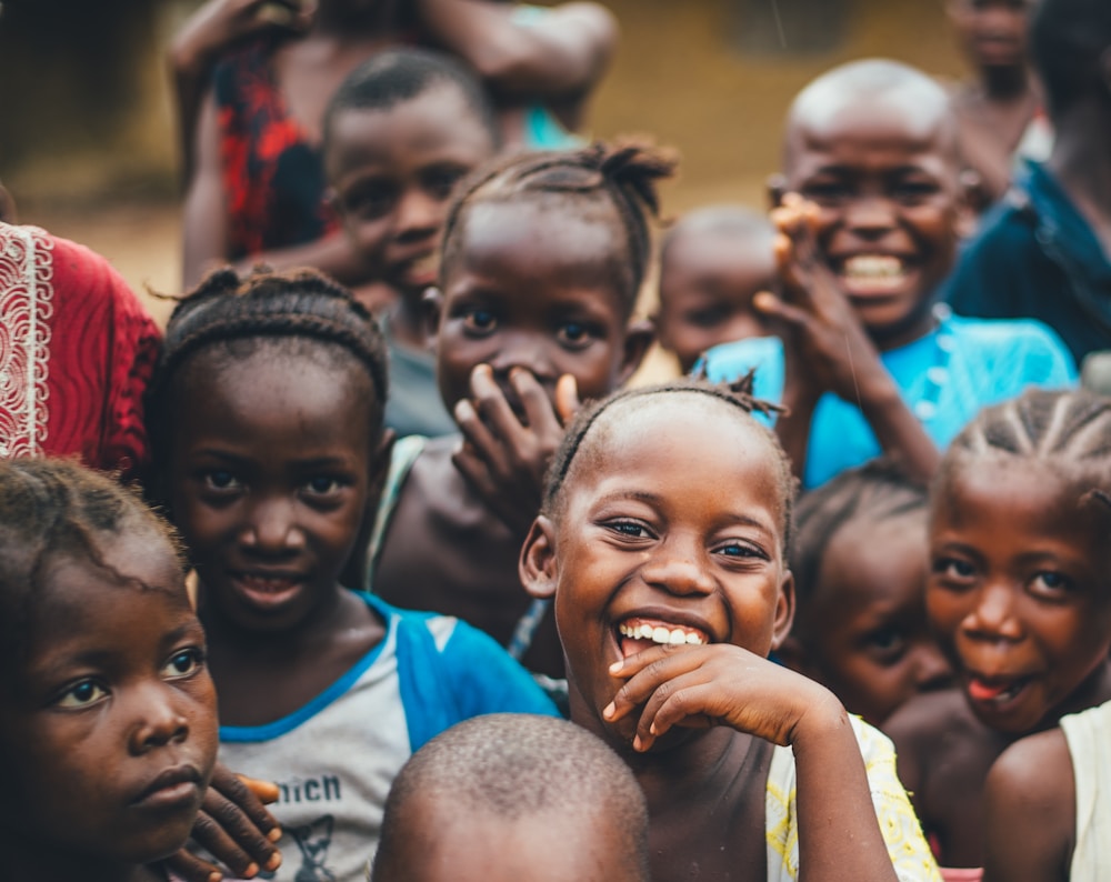 Children together in an outdoor community setting